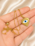 Collar de ojo turco dorado en acero inoxidable con dije en forma de corazón