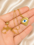 Collar de ojo turco dorado en acero inoxidable con dije en forma de corazón